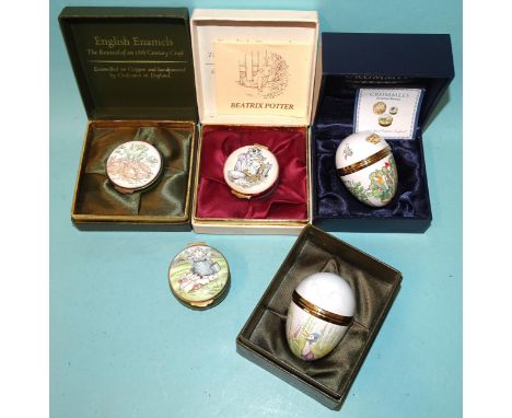 Crummles &amp; Co, a collection of three Beatrix Potter themed circular enamel pill boxes, (two boxed) and two egg-shaped con