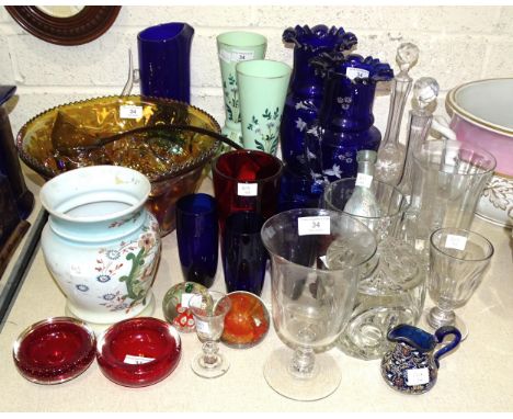 An orange lustre glass punch bowl and twelve cups, a pair of late-19th century blue glass vases with white enamel floral deco