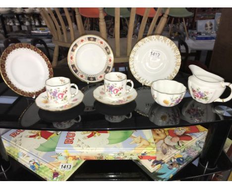 A quantity of various pieces of Royal Crown Derby china, 3 small plates, cups/saucers, jug and bowl