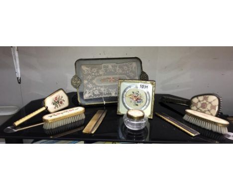 A vintage dressing table set with matching clock