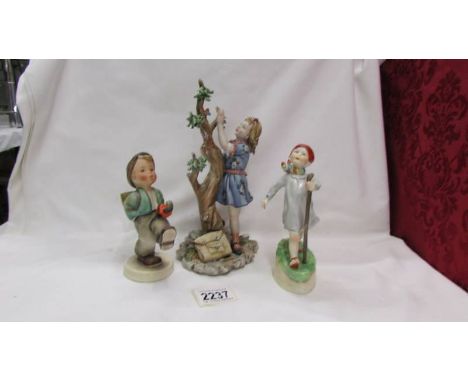 A Royal Worcester figure 'Thursday's Child', a Goebel boy and a figure of a girl.