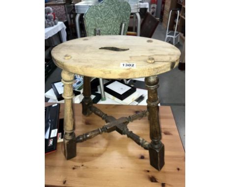 A vintage oak stool