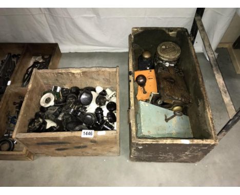 A pine box of vintage bakelite electrical fittings and a similar box of vintage door locks