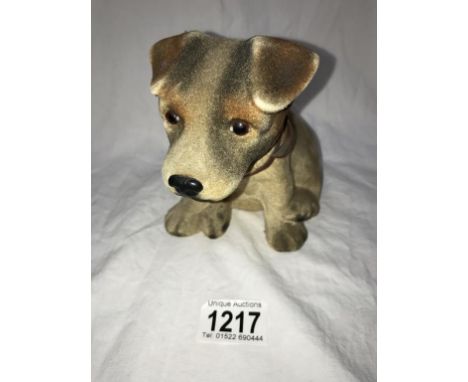 A vintage felt covered pottery nodding dog