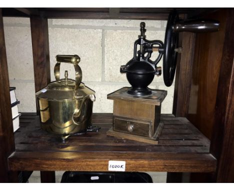 A brass kettle, cast iron trivet &amp; a coffee grinder