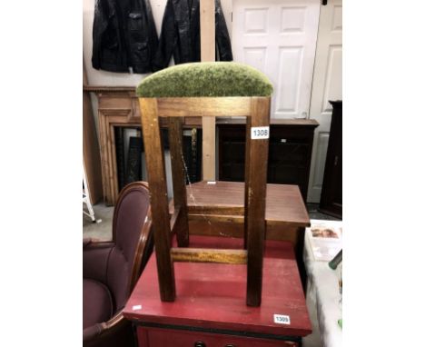 A vintage oak kitchen stool