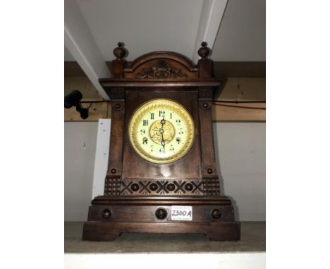 An Edwardian mahogany cased mantle clock The British United clock Co. Ltd, Birmingham, England, with pendulum &amp; key ****C