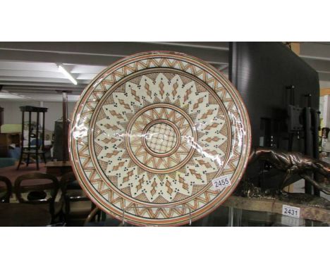 A large geometric pattern ceramic bowl, 16.5" diameter.