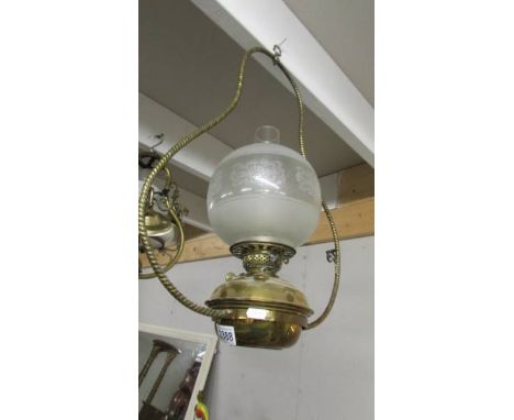 A hanging oil lamp.  (collect only).