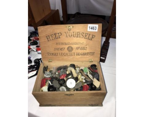 An old box of vintage buttons