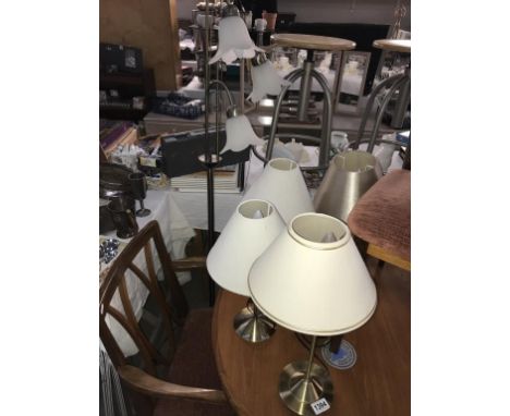 4 brushed brass table lamps and a floor standing standard lamp