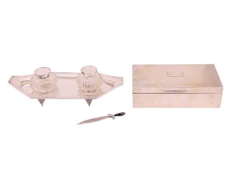 An Edwardian two bottle inkstand, Chester 1901, by Stokes and Ireland, of elongated octagonal form with reeded border and ree