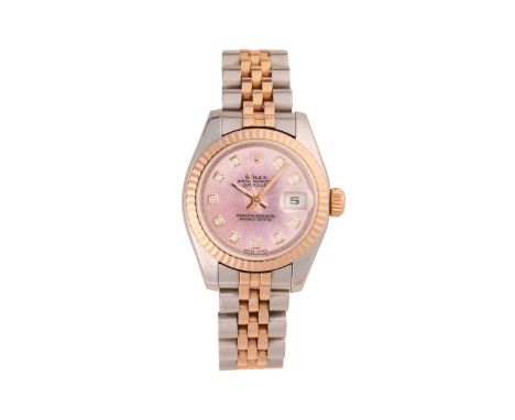 RolexLady’s DatejustModel: 2320Serial: D239850, engraved to rehaut at six o’clockBezel: FlutedYear: June 2005Case Material: S