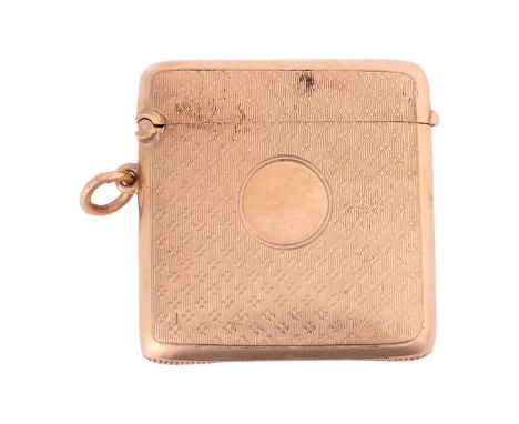 A vesta case in 9ct yellow gold, of square form, fully decorated with engine-turned diapering pattern, with an empty round ca