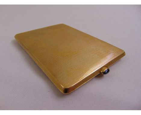 14ct yellow gold engine turned cigarette case with cabochon sapphire button, approx total weight 152.8g