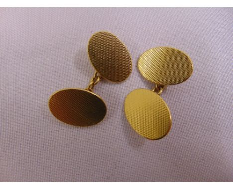 A pair of 18ct yellow gold engine turned cufflinks, approx total weight 13.1g