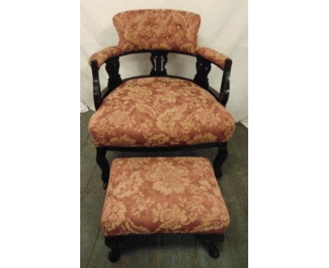 An Edwardian upholstered occasional chair with matching foot stool