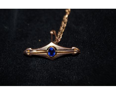 Victorian 9ct gold pin brooch with central blue gem stone (Possibly sapphire) 