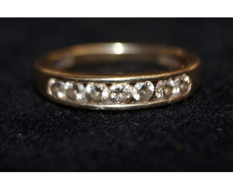 9ct Gold Half Eternity Ring set with 7 Diamonds (approx .50 ct).Size M