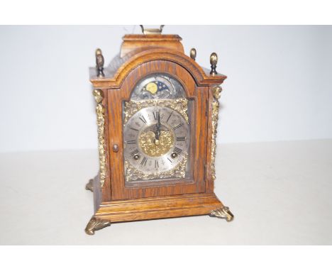 Ornate Wooden Cased Moon Face Mantle Clock