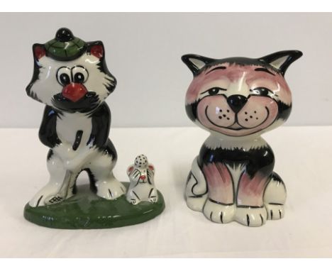 2 signed Lorna Bailey ceramic cat figurines. One of pink, black and white colourway and a golfer cat with a mouse holding a g