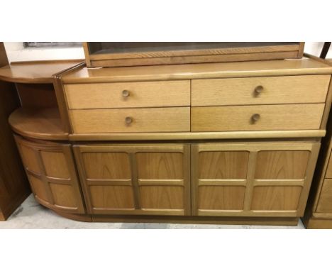 A vintage teak 2 door, 4 drawer sideboard by Nathan. Together with matching corner cupboard with shelf . Total width approx. 