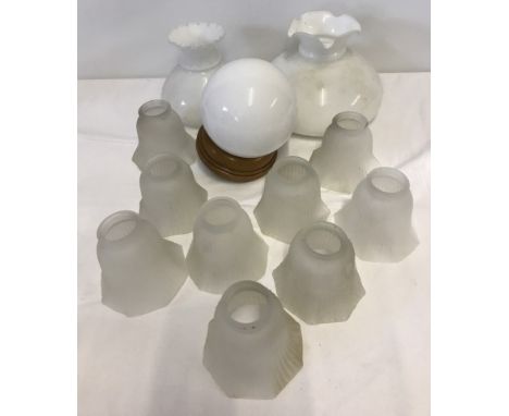 A box of glass lamp shades. Includes oil lamp shade. 