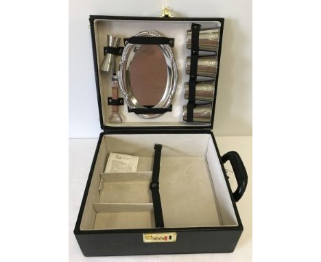 A new leather alcoholic spirit 'tot' travelling/picnic case. New, containing spirit measure, tray and cups. Combination lock.