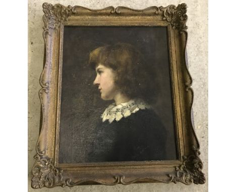 An antique gilt framed oil on canvas portrait of a child with a lace collar. Has had some restoration. Indistinct signature t
