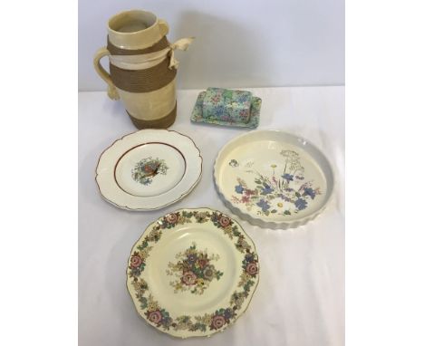 A collection of ceramic items. To include a Poole Pottery flan dish and a vintage Shelley chintz butter dish. 