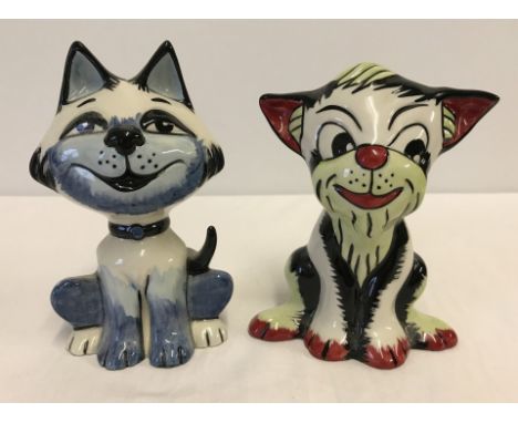 2 ceramic cat figurines by Lorna Bailey. A blue black and white colourway cat together with one of red and pale green coloura