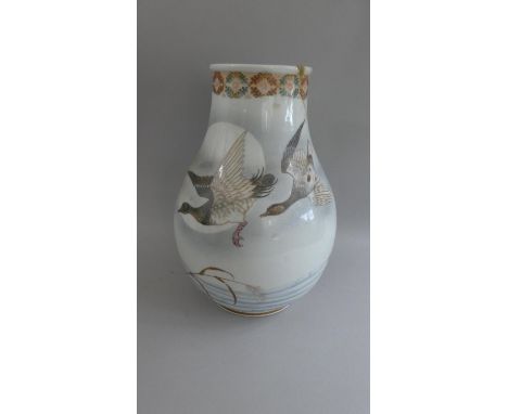 A Hand Painted Chinese Vase. The Body Decorated with Ducks in Flight and in Water with Reeds and Rose Hips. Underglazed Blue 