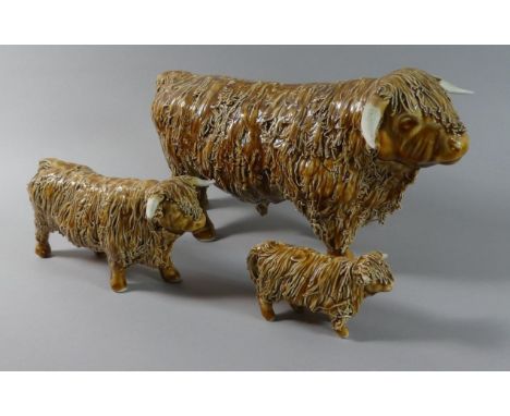 Three Scottish Ceramic Models of Highland Cattle, The Largest Signed Under. 