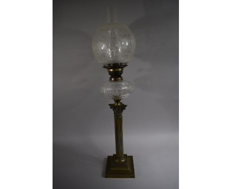 A Late Victorian Brass Corinthian Column Oil Lamp with Glass Reservoir, Etched Shade and Stepped Base. 80cms High Max&nbsp;
