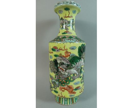 A Chinese Porcelain Vase, Decorated with Various Mythical Beasts. Yellow Ground with Green and Brown Decoration. 34cms Tall, 