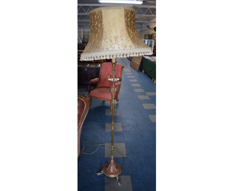 A French Style Brass Standard Lamp, Reeded Column with Acanthus Leaves, Three Pad Feet and with Silk Shade with Gilt Thread.&