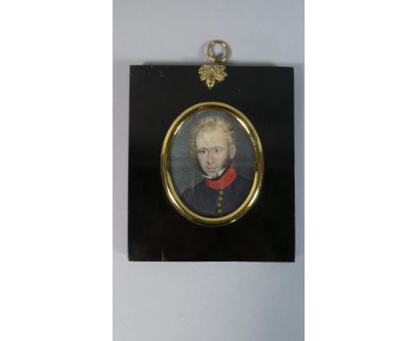 A Framed Oval Portrait Miniature of an Unknown 19th Century Young Officer. Frame 13x11cms 