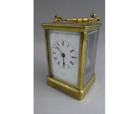 A Brass Cased and and Glazed Panel Repeater Carriage Clock. Signed F Flowers. St James's Street, S.W. Second Hand Damaged and