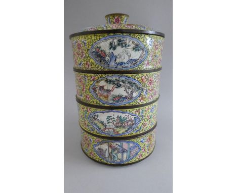 A 19th Century Chinese Circular Enamelled Four Section Stacking Food Box. Decorated with Figures, Stag, Bat, Herons, Lions in