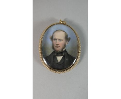 A Gold Framed Oval Portrait Miniature Pendant, A 19th Century Unknown Gent with Braided Hair Verso. 5.25cms High 