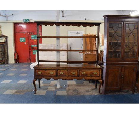A Late 18th/Early 19th Century Oak Dresser having Crossbanded Top, Three Drawers with Shaped Apron and Three Shelf Plate Rack