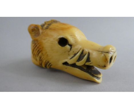 A 19th Century Carved Stick or Parasol Terminal in the Form of a Wild Boar Head. 