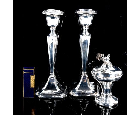 A pair of silver table candlesticks, silver dressing table atomiser, and Dunhill Rollagas blue lacquer pocket lighter (4)Lot 