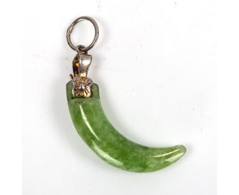 A Chinese carved and polished jade claw design pendant, height excluding bale 24.1mm, 2.3gNo damage or repair, mount slightly