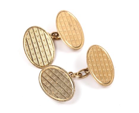 A pair of early 20th century 9ct gold oval cufflinks, engine turned decoration, maker's marks LAP, hallmarks Birmingham 1928,