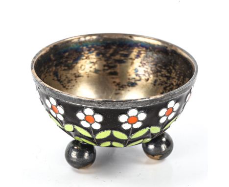 A Russian silver and champleve enamel salt cellar, daisy flower decoration on 3 bun feet, marks on base, bowl diameter 5cmNo 