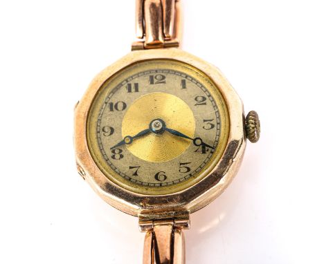 A lady's early 20th century 9ct rose gold mechanical bracelet watch, silvered and gilded dial with hand painted Arabic numera
