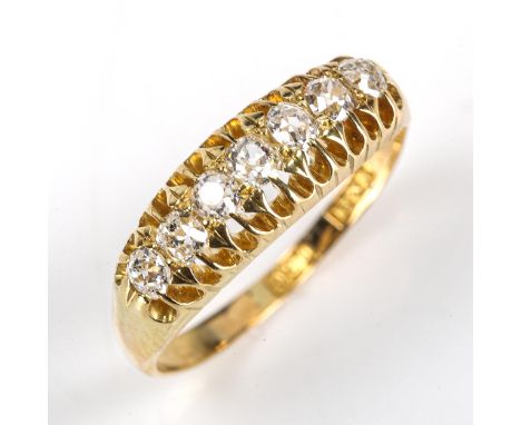 A Victorian 18ct gold graduated 7-stone diamond half hoop ring, set with old-cut diamonds, total diamond content approx 0.75c