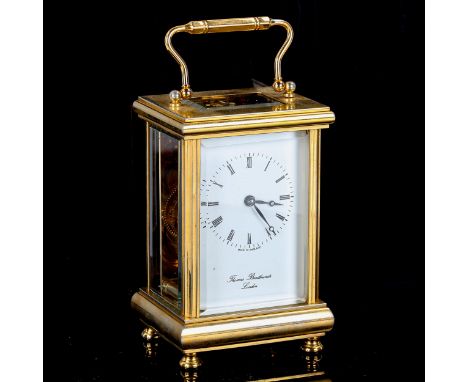 A modern brass-cased carriage clock, by Thomas Braithwaite of London, white enamel dial with Roman numeral hour markers and b