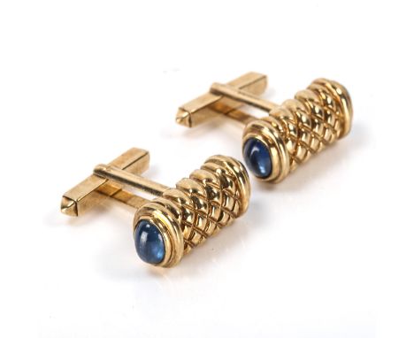 A modern pair of 9ct gold sapphire cufflinks, engraved lattice decoration with cabochon sapphire terminals, hallmarks Sheffie